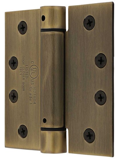 4 inch Single Action Spring Hinge with Square Corners in Antique Brass.